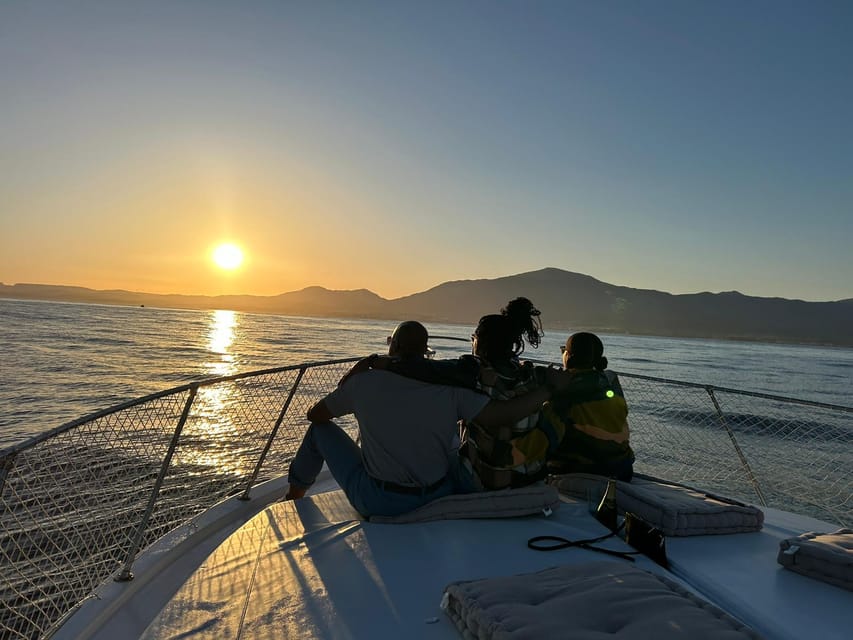Estepona: Dolphin Searching Sunset Cruise with Drink & Snack - Sunset from the shoreline side