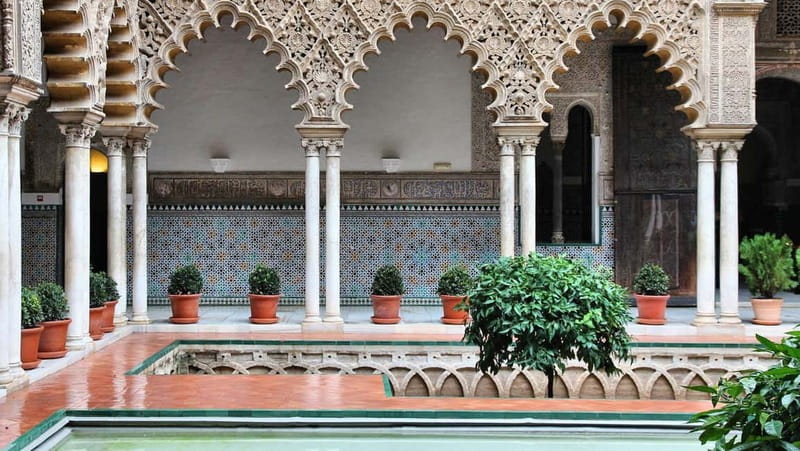From Malaga: Seville Day Trip with Real Alcázar Tickets - Inside the Real Alcázar, look beyond the rooms