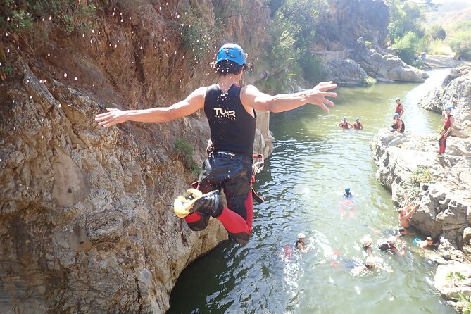 From Mijas: Guadalmina Canyon Canyoning Tour - A canyon route with more than one way through