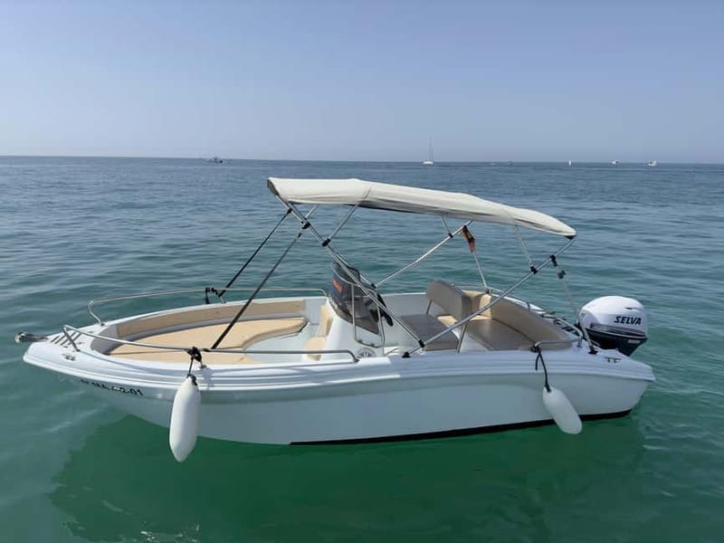 Malaga: Boat rentals without a license - Taking the helm after a short lesson
