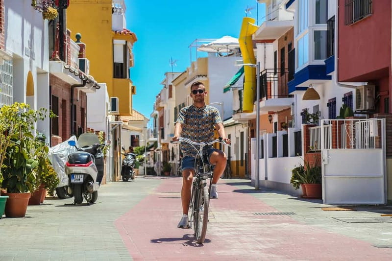 Malaga: Castle Hill and Fisherman Village E-Bike Tour - A city tour with a hill in the middle