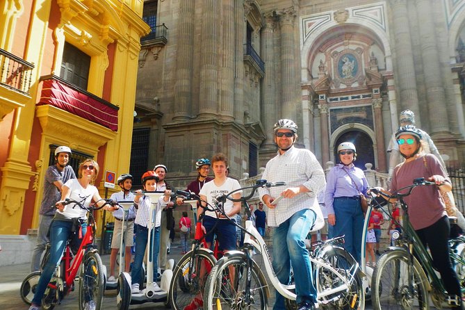 Malaga Electric Bikes Guided Tour - Guide style, stops, and group size
