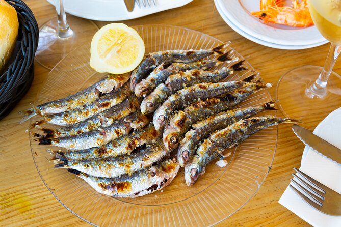 Malaga Food Tour: Tapas, Drinks and Delights with a Local - A Moscatel toast in a tavern from 1840