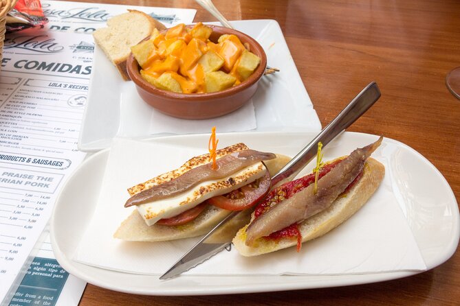 Malaga Food Tour: Tapas, Drinks and Delights with a Local - Who should book this Málaga food walk?