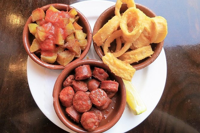 Malaga Market Food Tour: Tapas, Drinks, and Local Flavors - Four or five stops, with plenty to eat