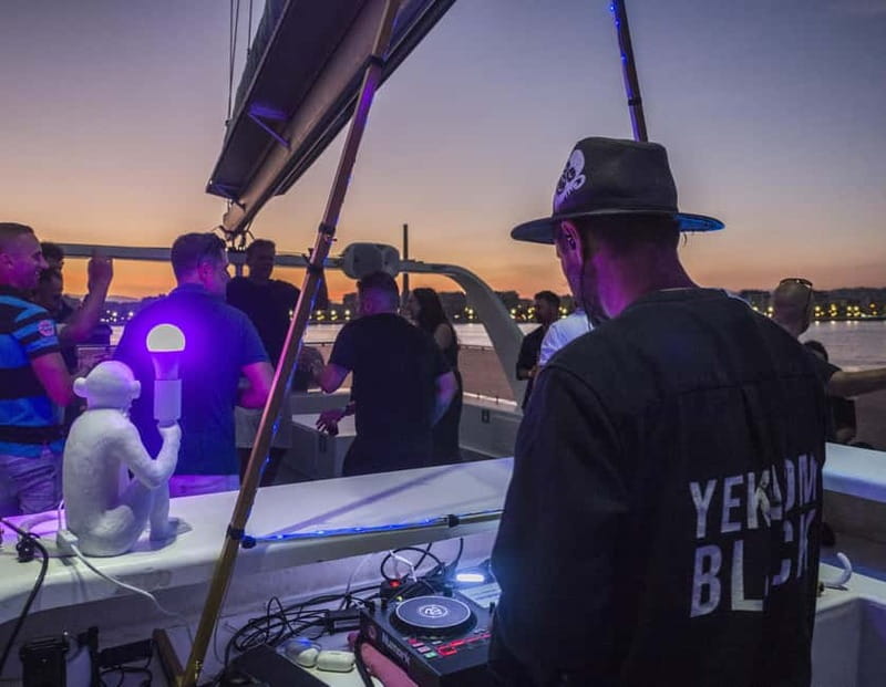 Malaga: Sailing Catamaran Sunset Cruise with Live DJ & Drink - Watching the sun drop over the Alboran Sea