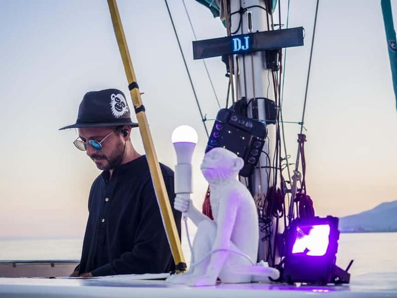 Malaga: Sailing Catamaran Sunset Cruise with Live DJ & Drink - What the 1.5-hour outing feels like