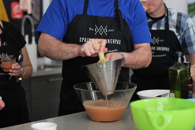 Malaga Tapas Cooking Class - Tasting olive oil before the cooking begins
