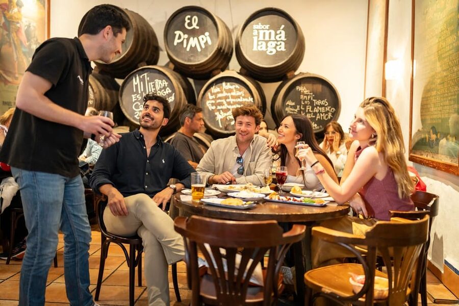 Málaga: Tapas, Wine & Rooftops Private Tour - The guide turns the walk into more than dinner