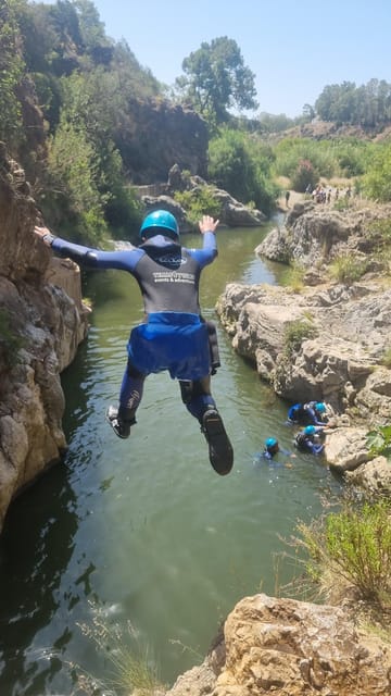 Marbella: Beginner Canyoning Tour with Safety Equipment - Walking downstream through the canyon