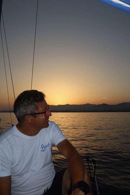 Marbella: Sunset Luxury Sailing Cruise in Puerto Banús - The Marbella coast at dusk