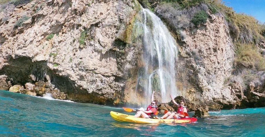 Nerja: Guided Kayak Tour Nerja Cliffs and Maro Waterfall - Leaving Burriana Beach for the cliffs